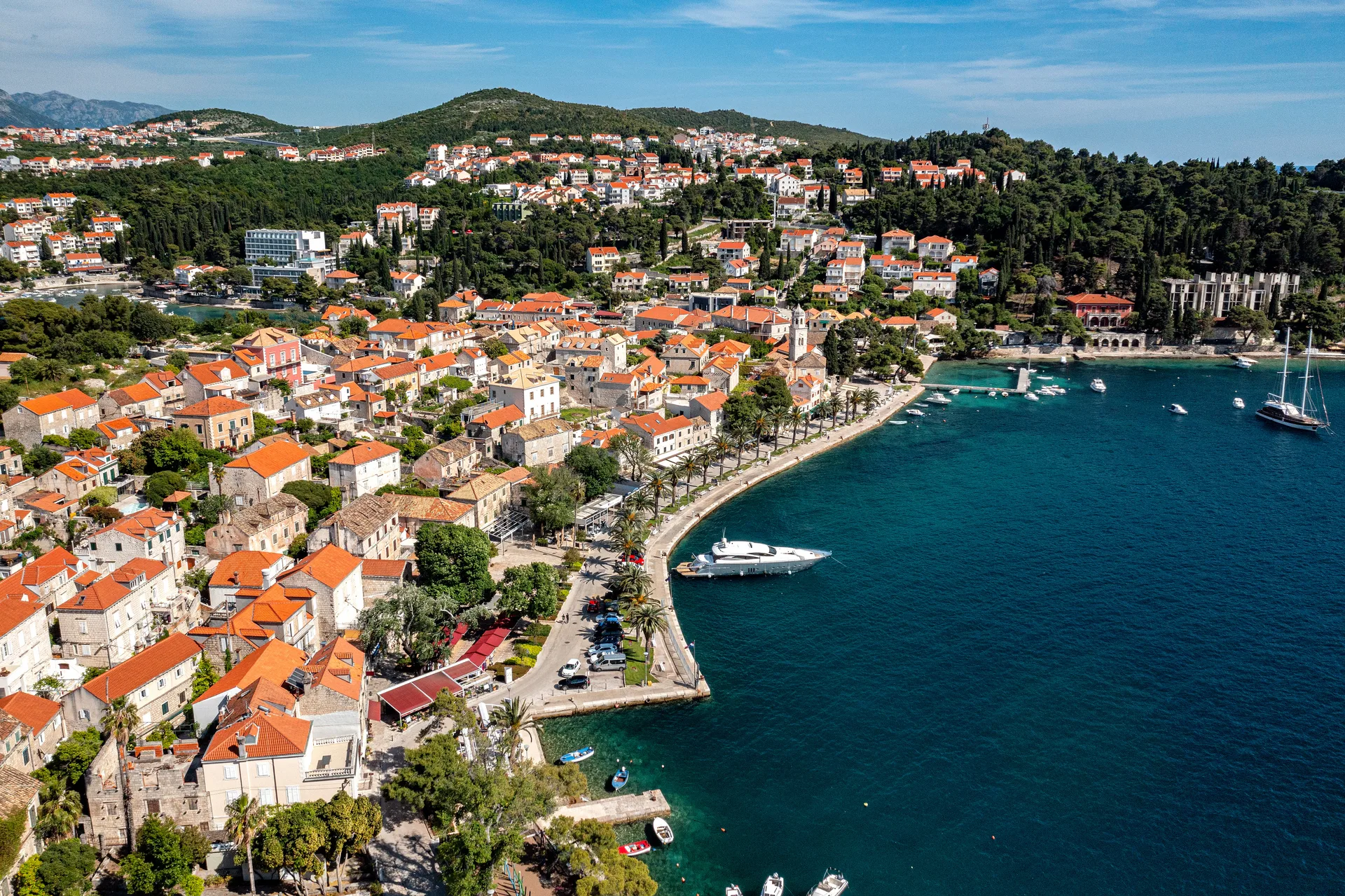 Aerial view of Cavtat's historic waterfront, promenade and harbor near Dubrovnik