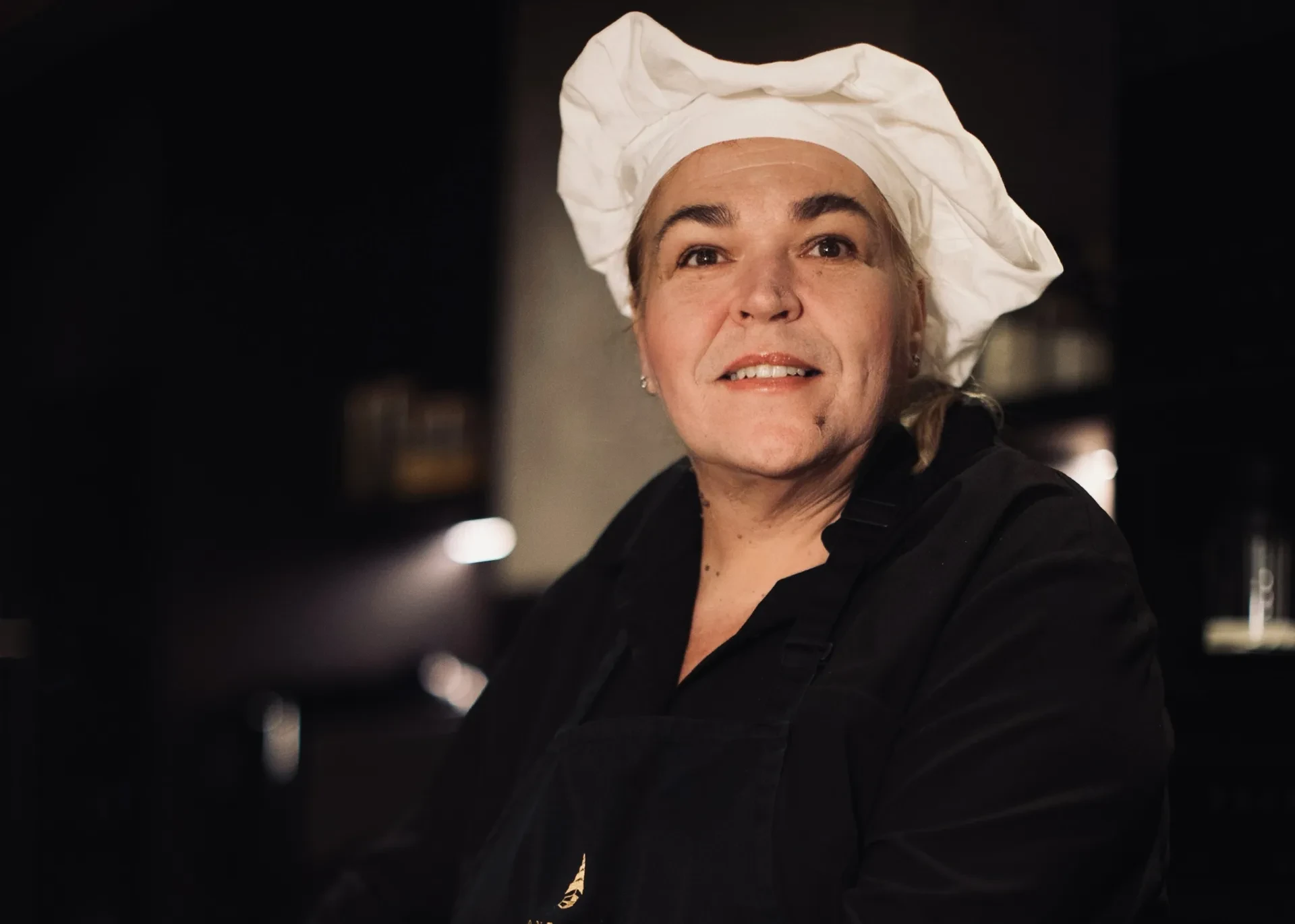 Portrait of the private chef preparing the family's New Year's dinner at Villa Majesty, Mali Lošinj