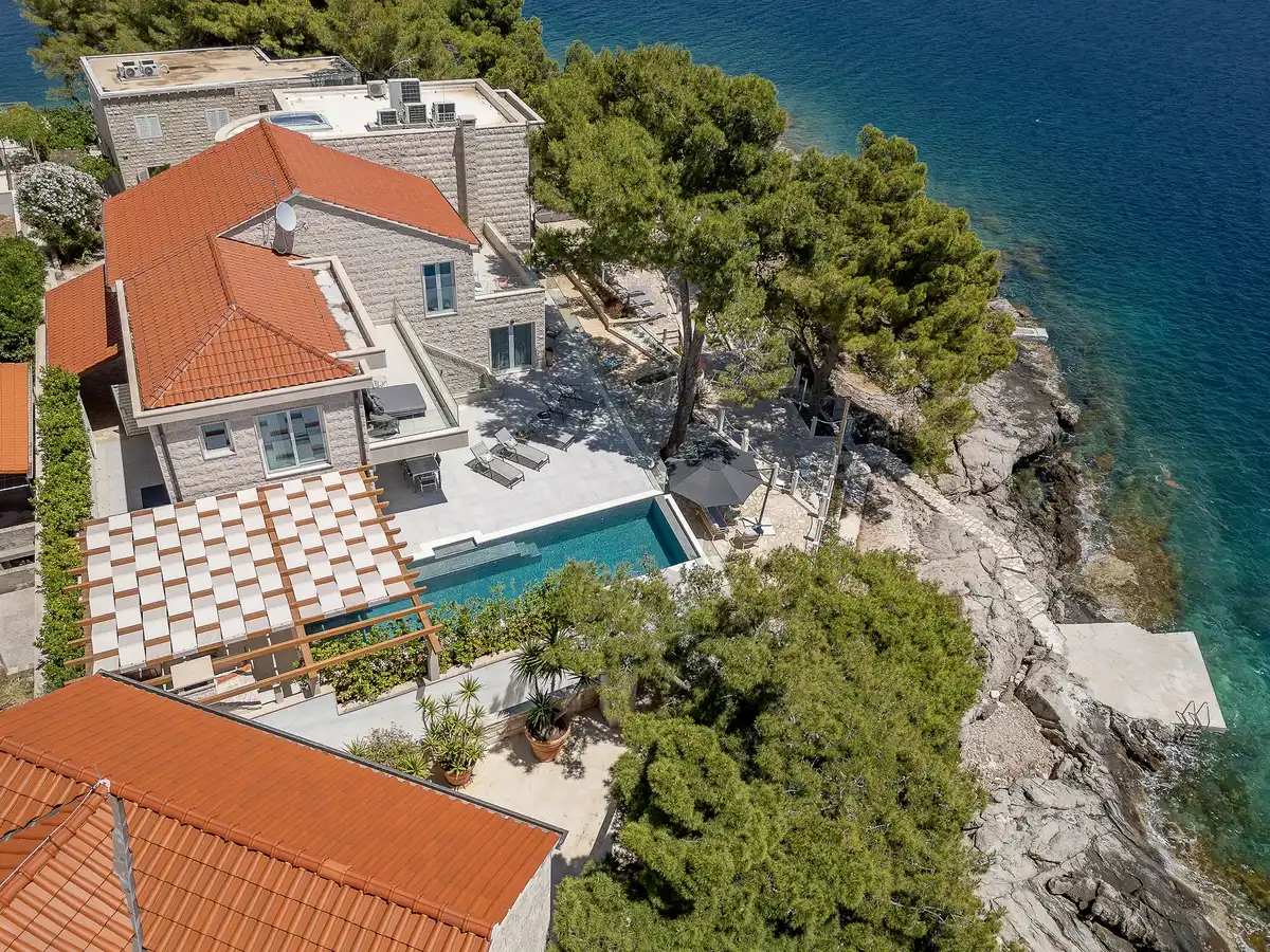 Villa Pedra's seafront pool built into the rocky coastline near Sumartin, eastern Brač