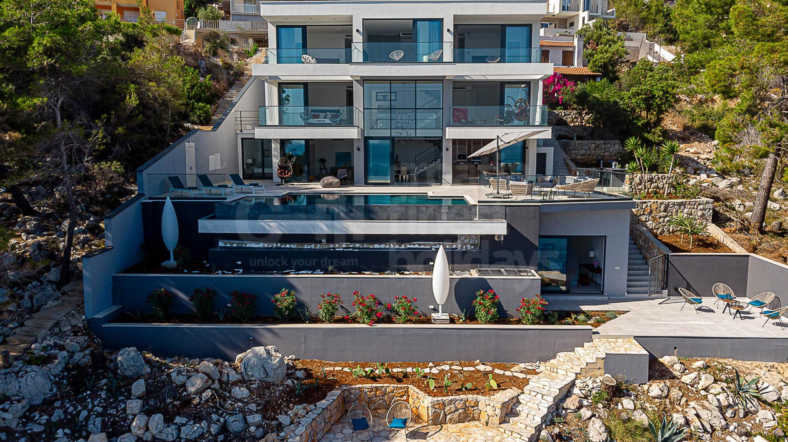 A view of luxury holiday Villa S with 6 bedrooms, a private pool, gym, and concierge service on Korcula