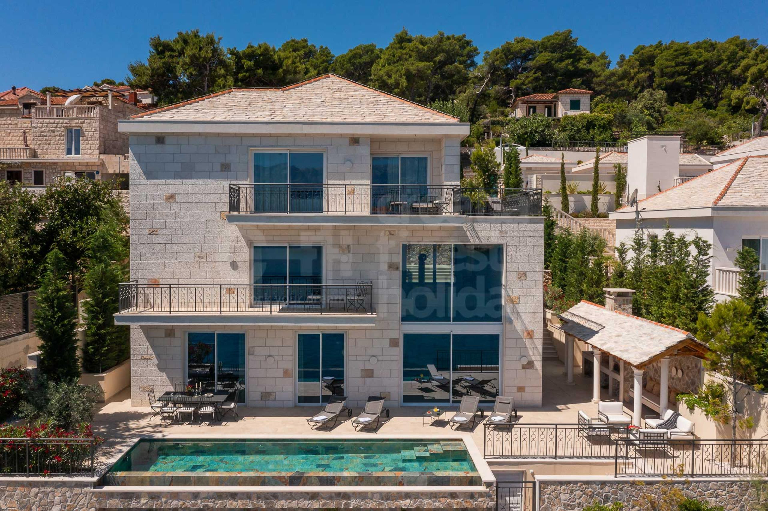 Luxury Croatian villa Heda with a heated pool, wellness and gym by the sea on island Brac