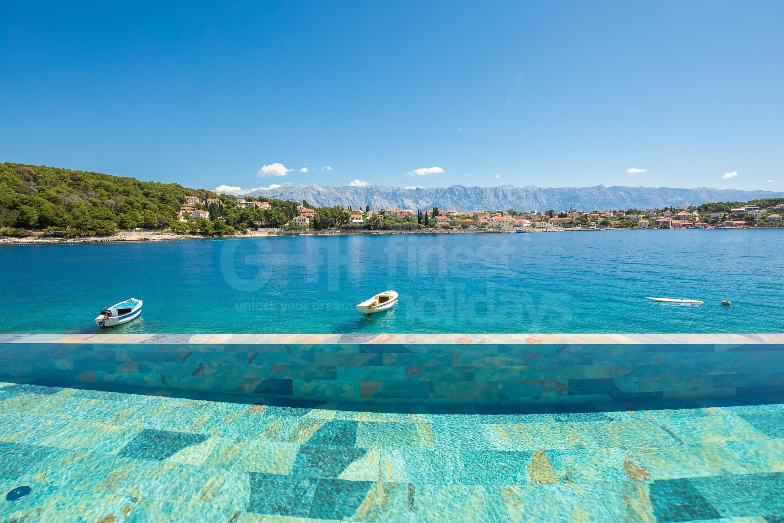 Seafront luxury Villa Heda on island Brac with heated pool by the sea