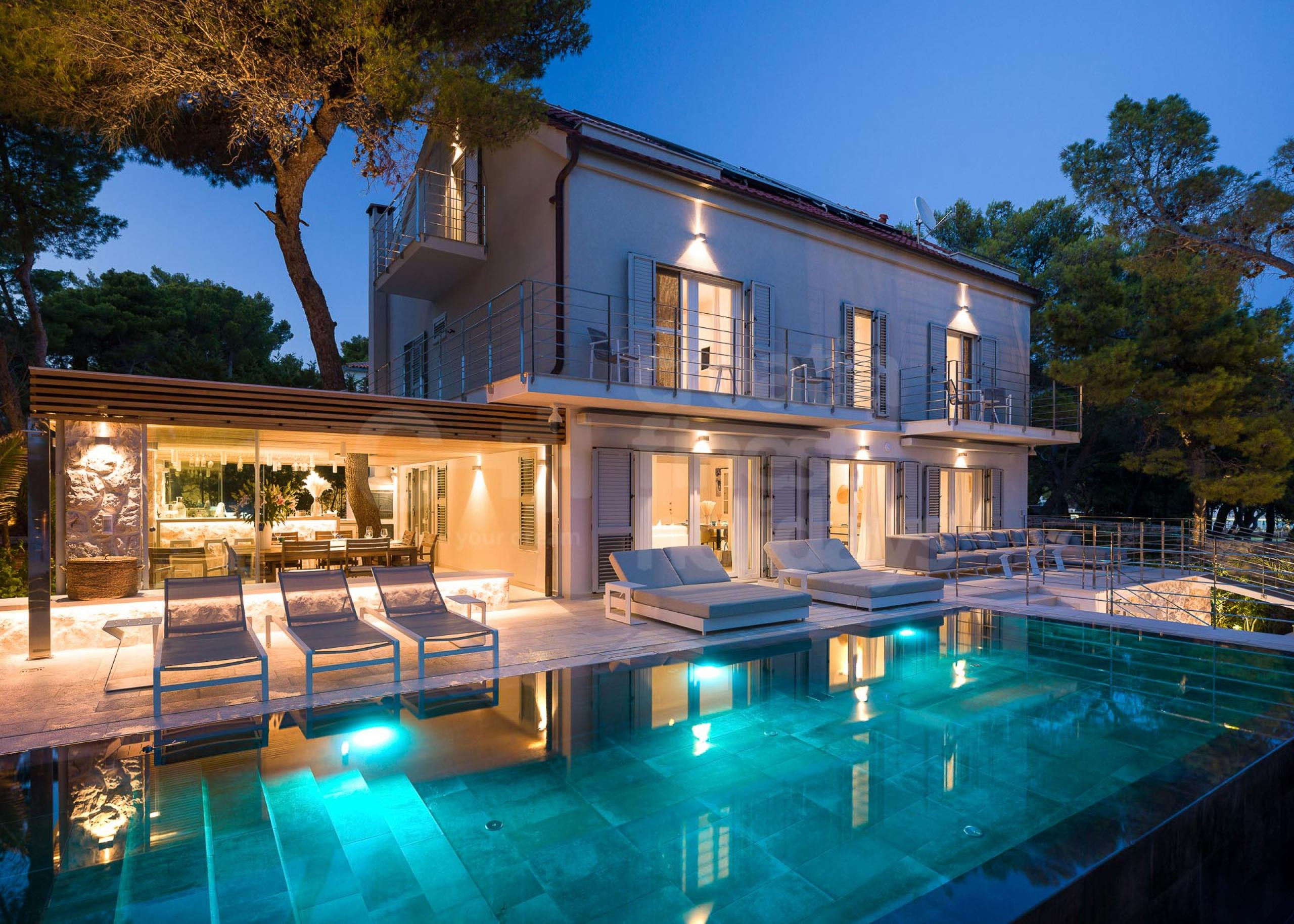 Exterior of a luxury Croatian villa for rent and vacation with a heated infinity pool on the island of Hvar