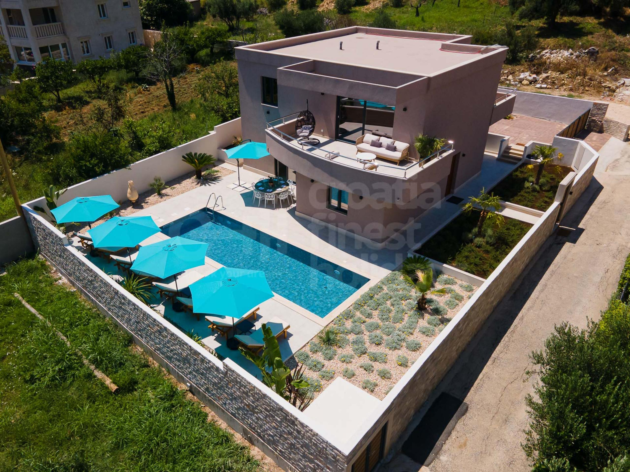 Modern private villa Dubrovnik Lagoon by the sea with private pool and sun loungers