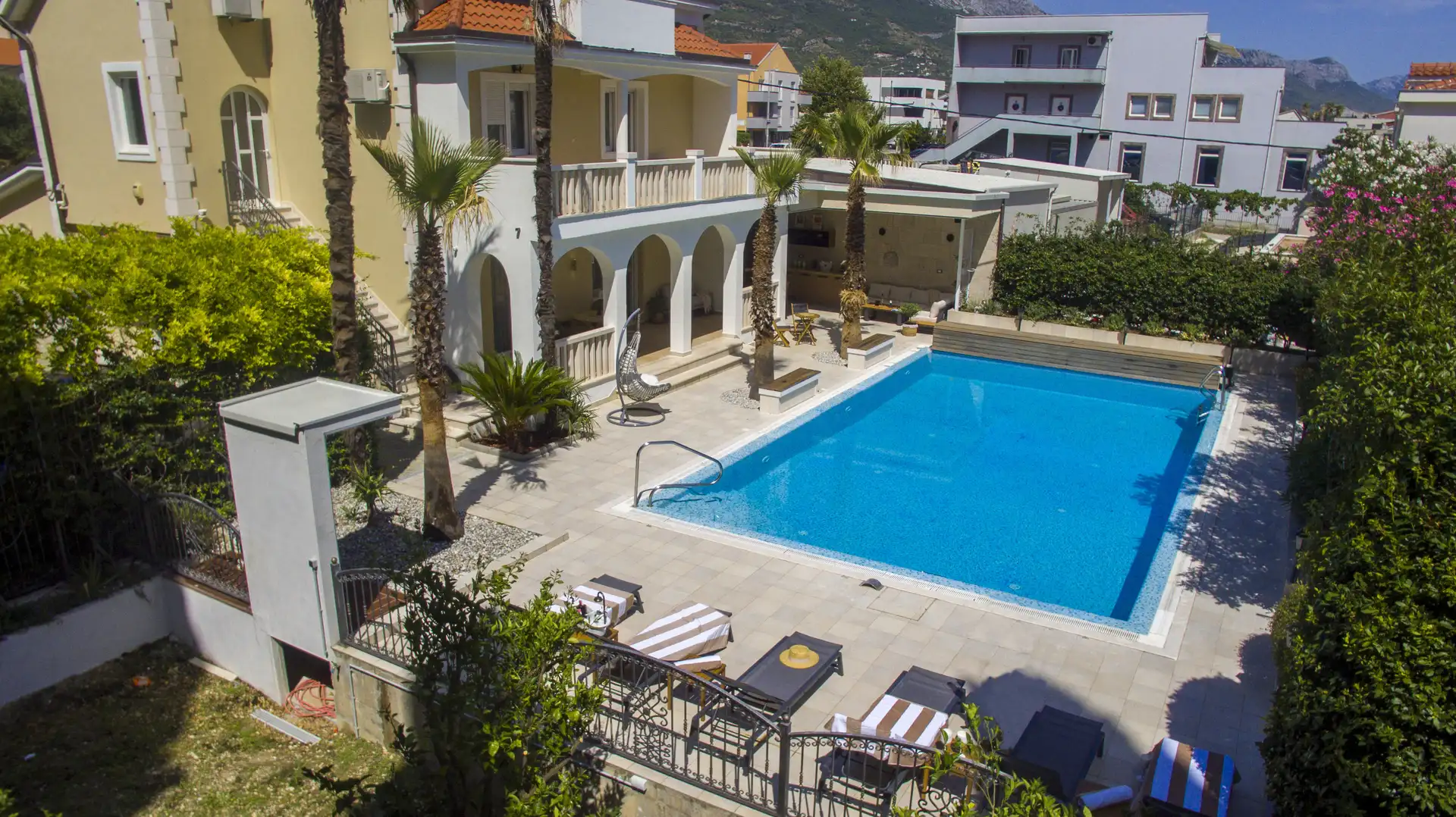 A stunning villa with a swimming pool and patio, perfect for relaxation in Split, Kastela, Croatia.