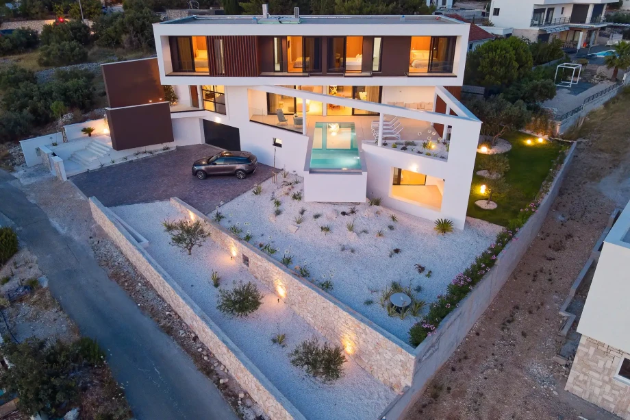 Villa Serena in Primosten, Croatia, showing a modern design with a pool and terrace, ideal for a relaxing getaway.