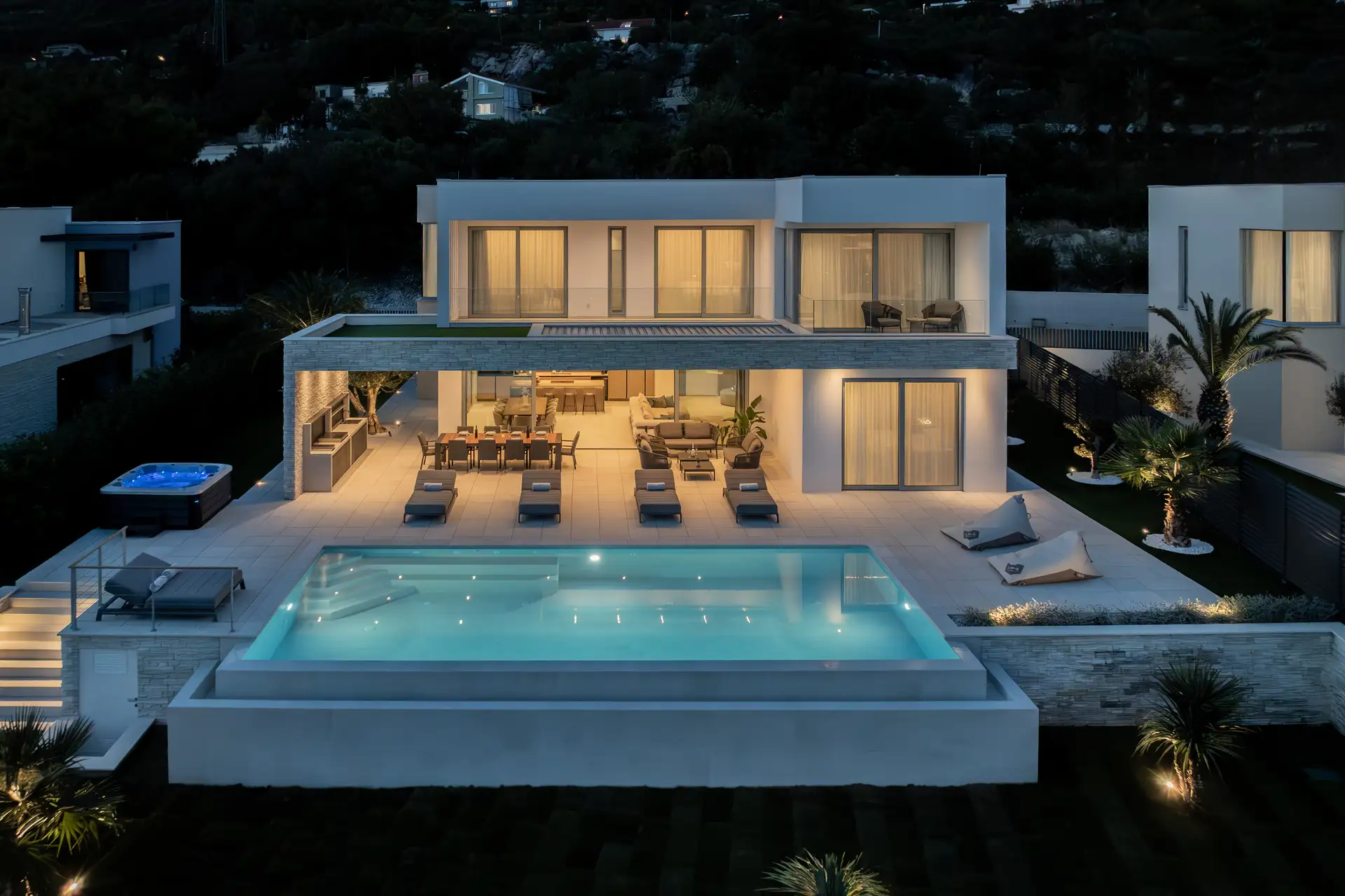 Night photo of luxury villa Kira in Split with swimming pool