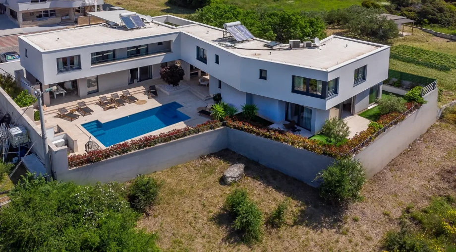 Aerial view of Villa Adria with private pool and spacious terrace in Kaštel Sućurac near Split.