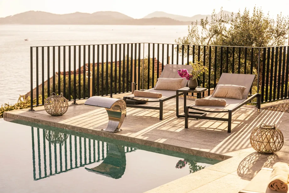 Poolside sun loungers.