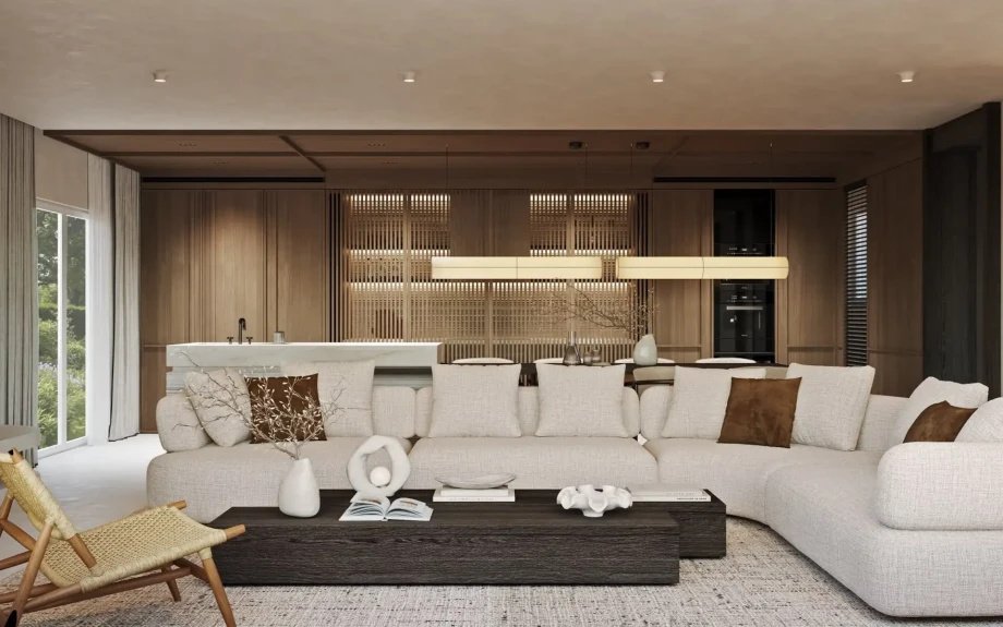 2027 render of an open-plan living area with sectional sofa, dining area and contemporary kitchen.