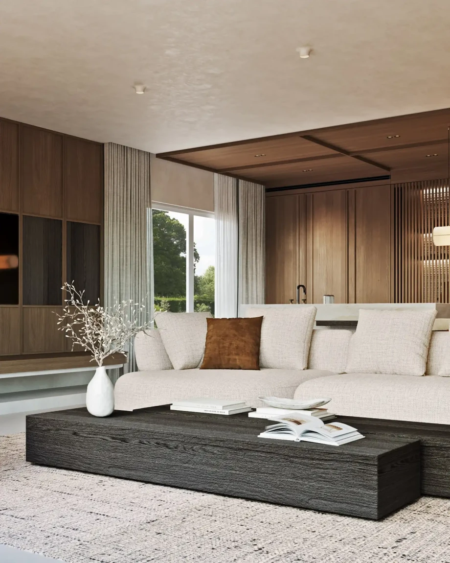 2027 render of a luxury living area with modular sofa, dark wood coffee table and open kitchen.